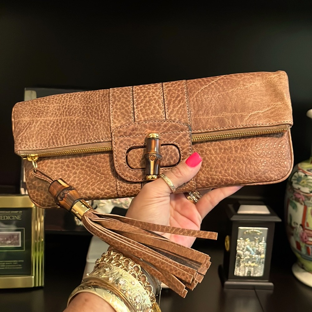DO NOT PURCHASE Gorgeous!! and Never used Authentic Gucci Bamboo Clutch!